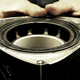 A vintage photo of a triangular Mazda rotor.
